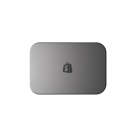 Top-down view of the Shopify POS Hub, a rounded rectangle with a subtle Shopify shopping bag logo embossed in the center